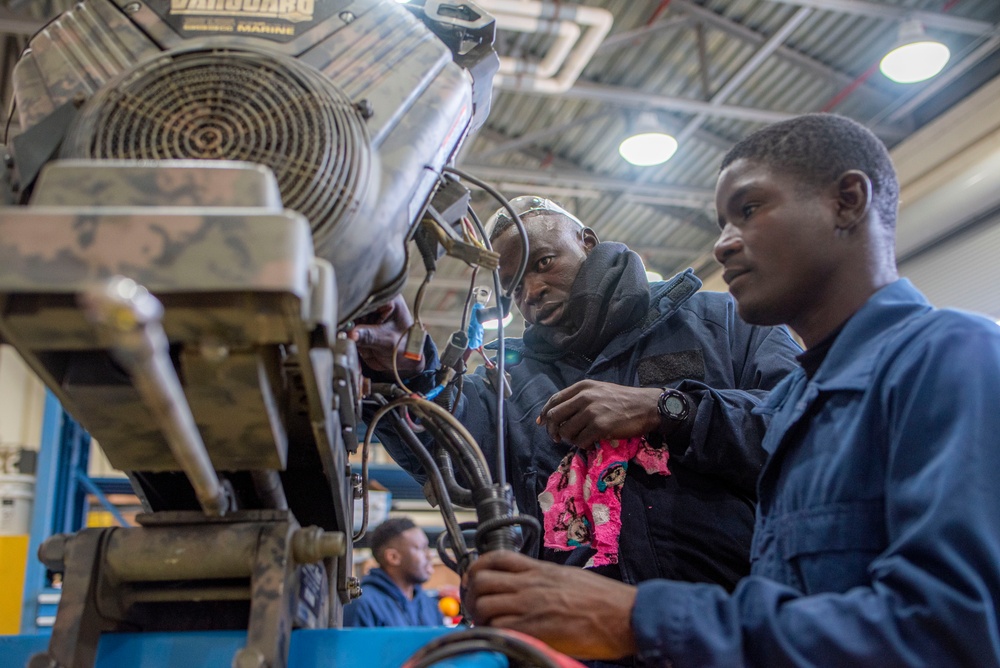 NAVSCIATTS Students Dissect Outboard Motor Engines