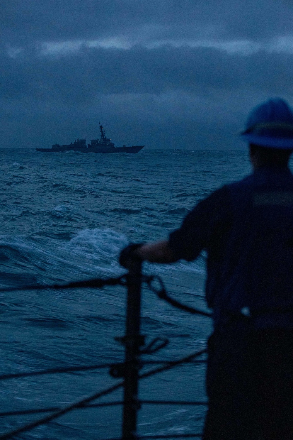 USS Chung-Hoon sails past USS Wayne E. Meyer.