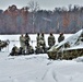 Airmen learn to build Arctic 10-person tents during cold-weather training at Fort McCoy