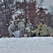 Airmen learn to build Arctic 10-person tents during cold-weather training at Fort McCoy