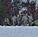 Airmen learn to build Arctic 10-person tents during cold-weather training at Fort McCoy