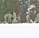 Airmen learn to build Arctic 10-person tents during cold-weather training at Fort McCoy