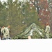 Airmen learn to build Arctic 10-person tents during cold-weather training at Fort McCoy