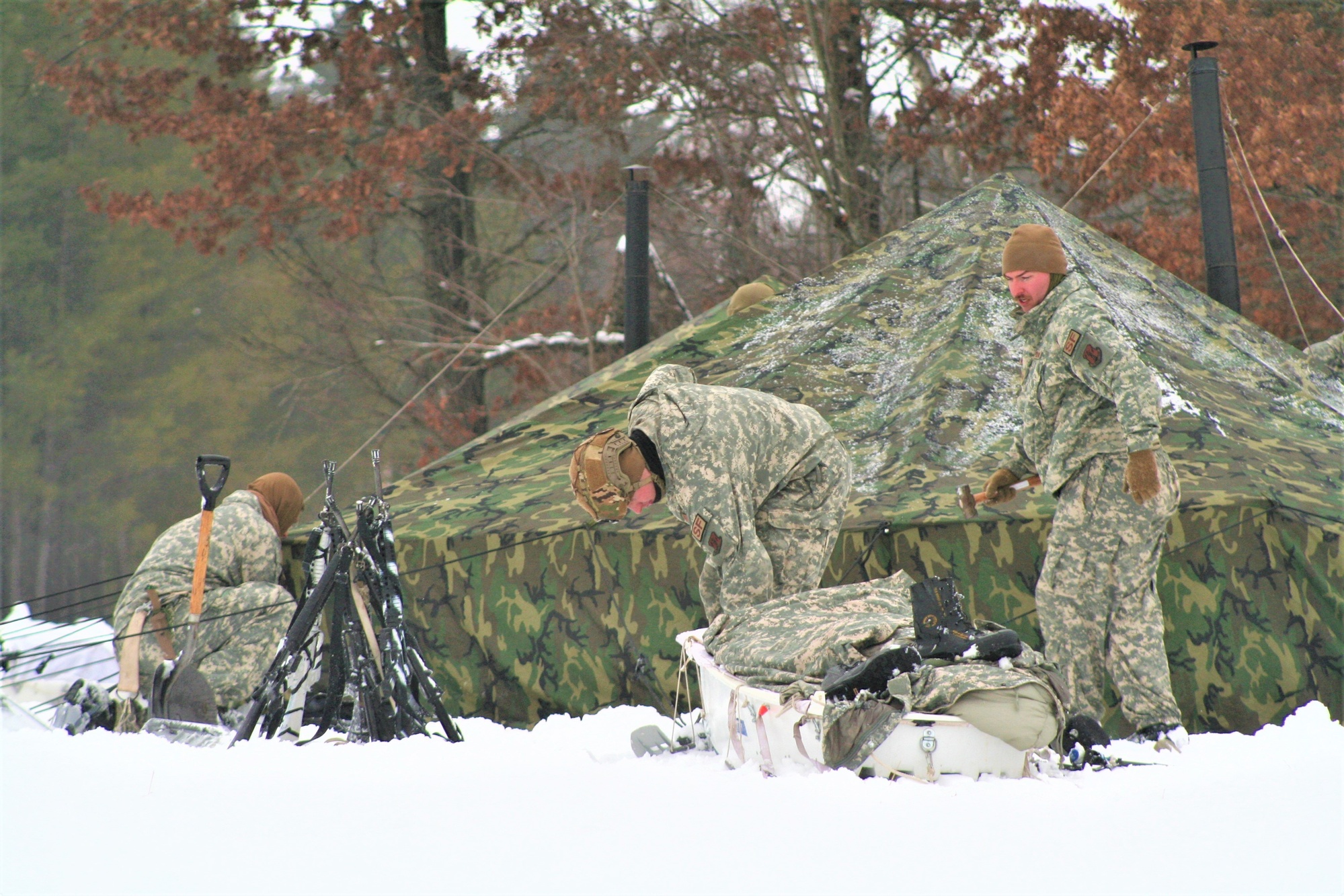 Soldiers learn to build Arctic tents during cold weather training at Fort  McCoy