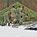 Airmen learn to build Arctic 10-person tents during cold-weather training at Fort McCoy