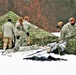 Airmen learn to build Arctic 10-person tents during cold-weather training at Fort McCoy