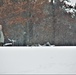 Airmen learn to build Arctic 10-person tents during cold-weather training at Fort McCoy