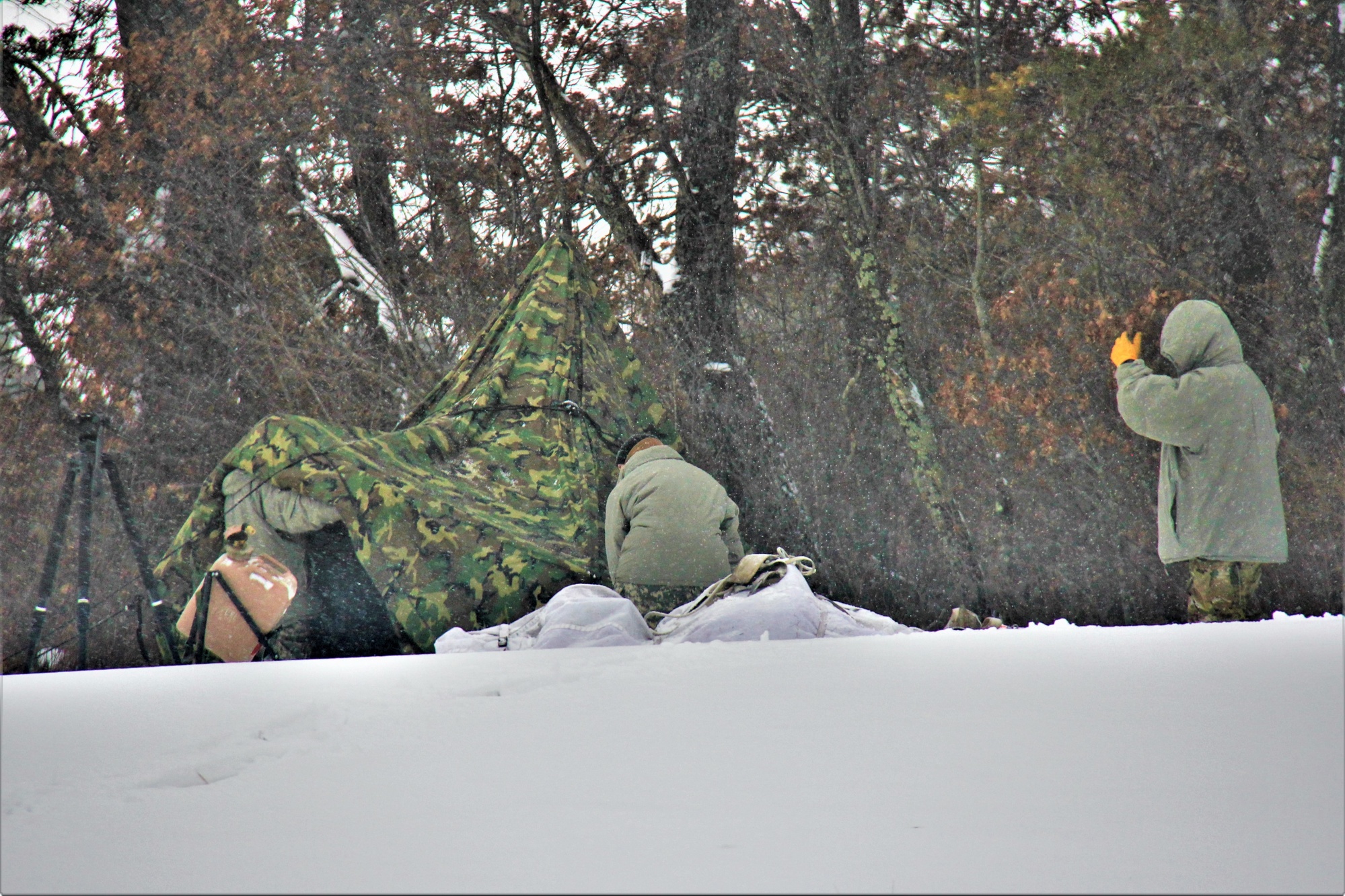 Soldiers learn to build Arctic tents during cold weather training at Fort  McCoy