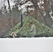 Airmen learn to build Arctic 10-person tents during cold-weather training at Fort McCoy