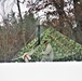 Airmen learn to build Arctic 10-person tents during cold-weather training at Fort McCoy