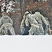 Airmen learn to build Arctic 10-person tents during cold-weather training at Fort McCoy