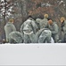 Airmen learn to build Arctic 10-person tents during cold-weather training at Fort McCoy