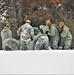 Airmen learn to build Arctic 10-person tents during cold-weather training at Fort McCoy