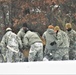 Airmen learn to build Arctic 10-person tents during cold-weather training at Fort McCoy