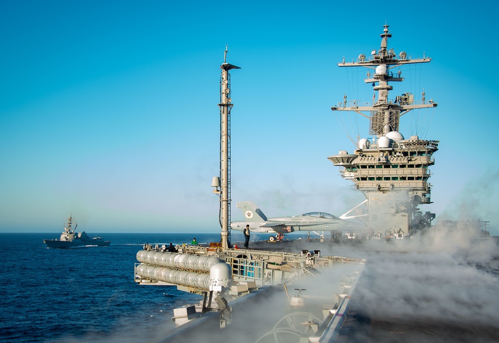 USS Carl Vinson (CVN 70) Traverses the Sea with USS Sterett (DDG 104)