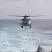 U.S. Navy MH-60R lands on USS Chung-Hoon