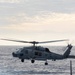 U.S. Navy MH-60R takes off from USS Chung-Hoon