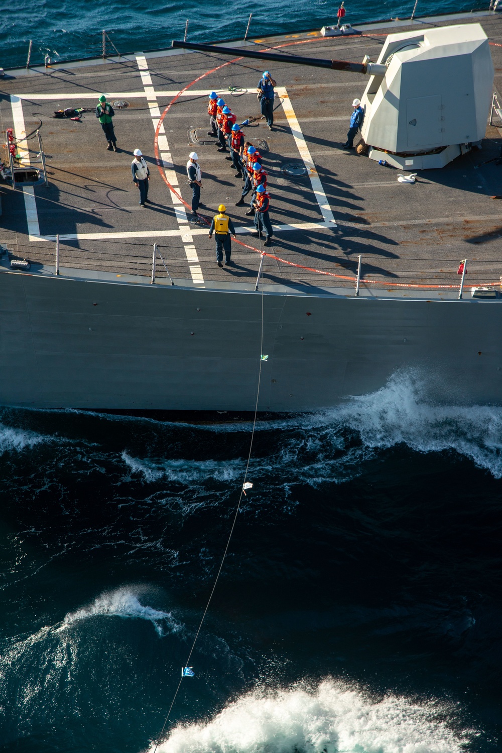 Sailors Heave Around Line