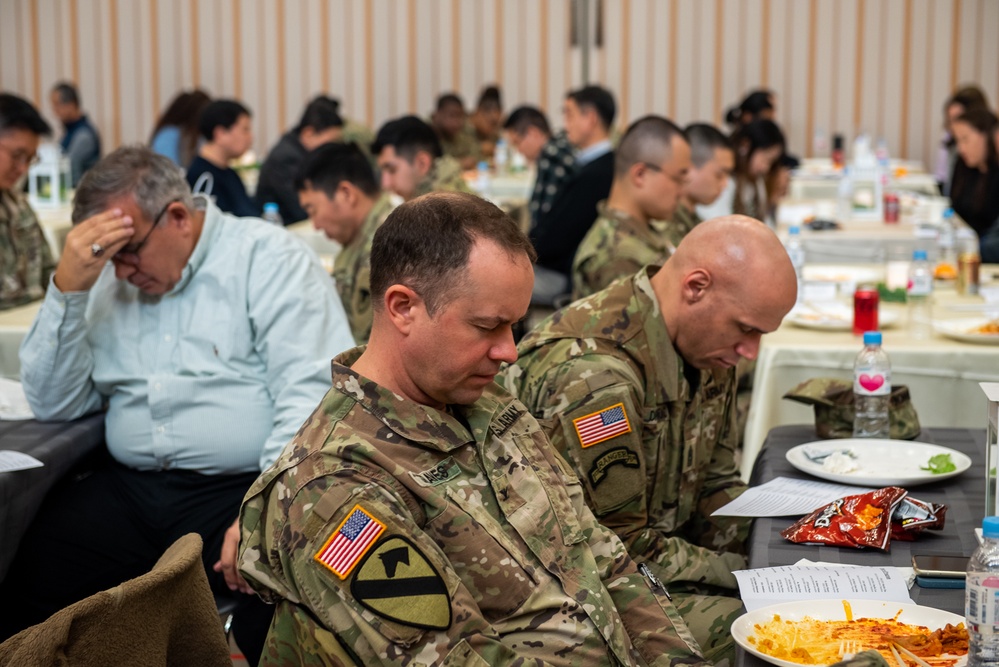 United States Army Garrison Humphreys parishioners pray for the heart of the nation