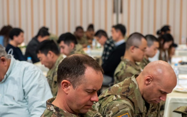 United States Army Garrison Humphreys parishioners pray for the heart of the nation