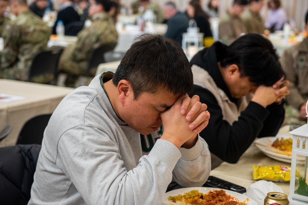 United States Army Garrison Humphreys parishioners pray for the heart of the nation