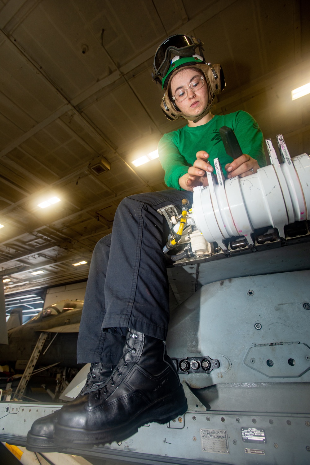 Sailor Removes Sealant From Aircraft Wingfold Transmission