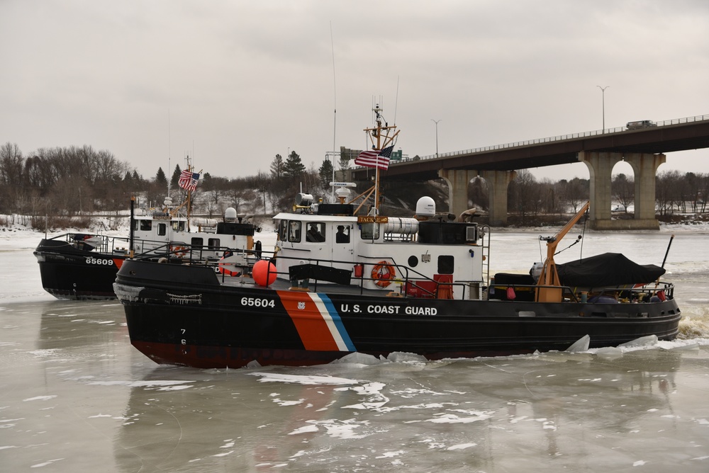 Coast Guard Cutters Shackle and Tackle breaks ice