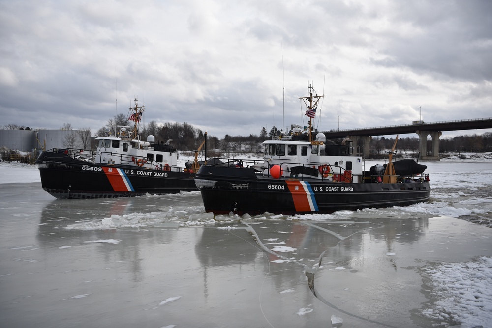 Coast Guard Cutters Shackle and Tackle breaks ice