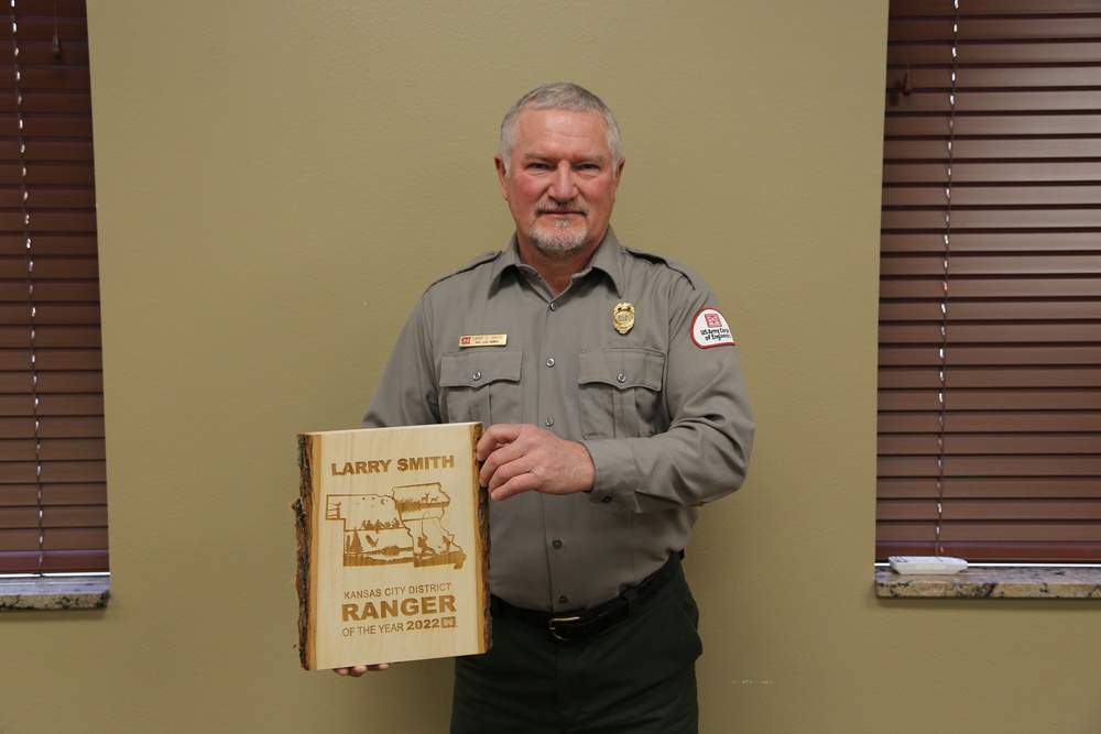 Larry Smith poses with his 2022 Ranger of the Year Award