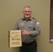 Larry Smith poses with his 2022 Ranger of the Year Award