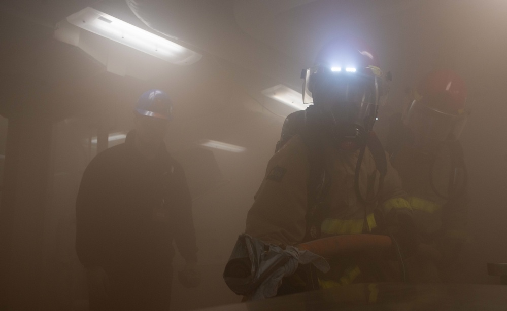 USS Ronald Reagan (CVN 76) conducts a joint damage control drill