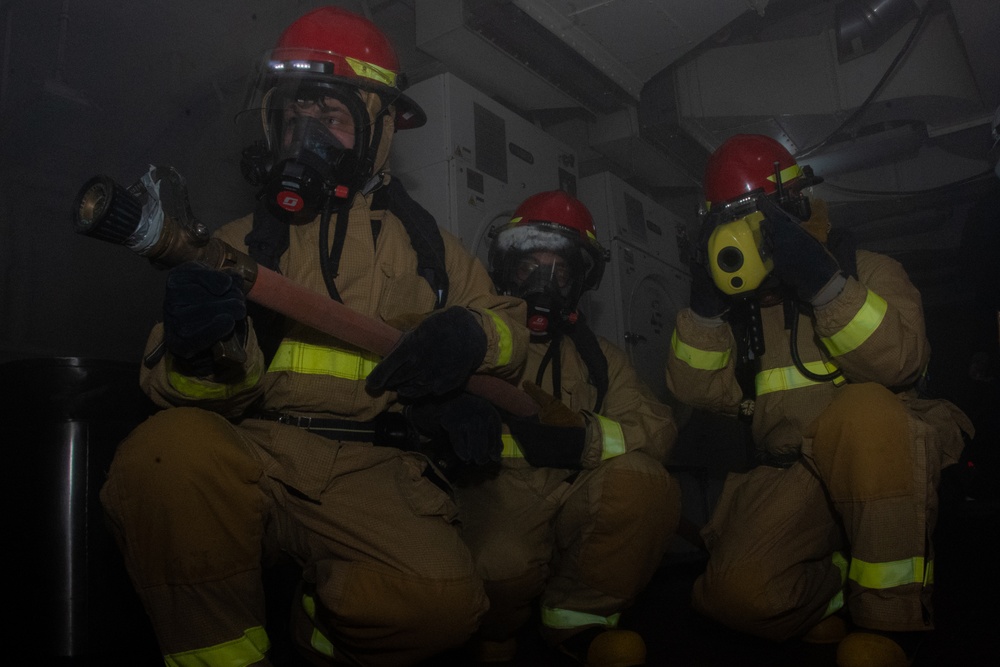 USS Ronald Reagan (CVN 76) Sailors practice firefighting drill.