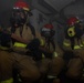 USS Ronald Reagan (CVN 76) Sailors practice firefighting drill.