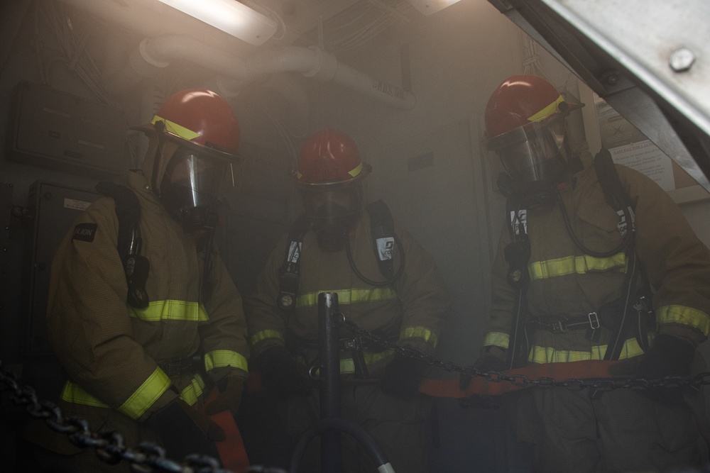 USS Ronald Reagan (CVN 76) Sailors practice firefighting drill.