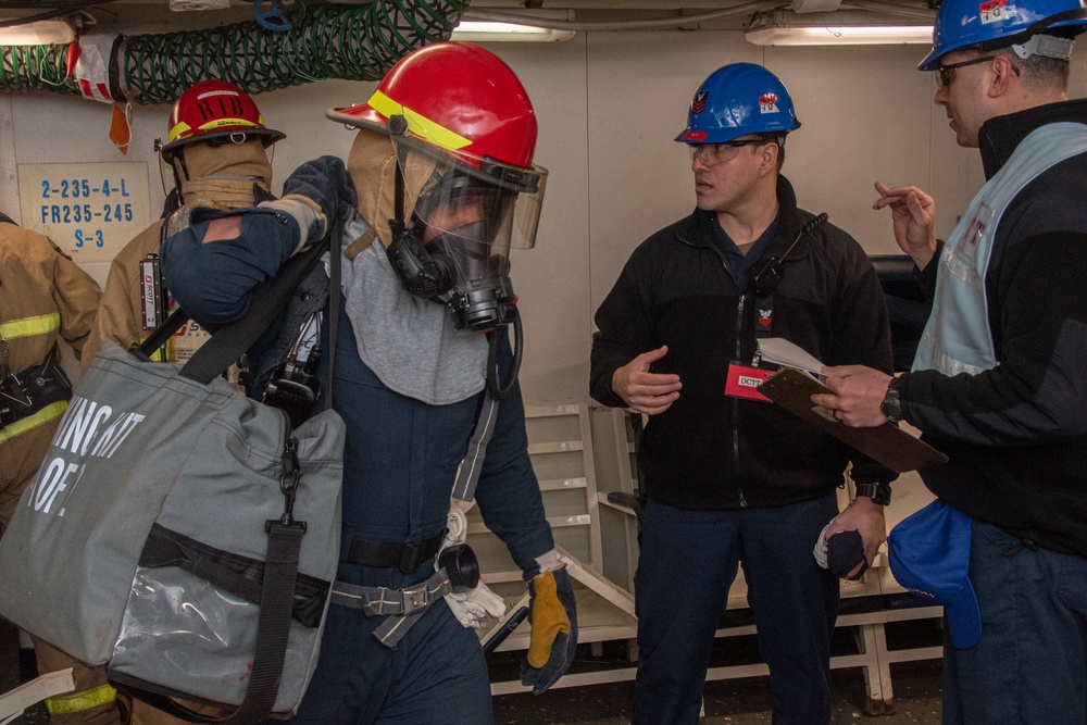 USS Ronald Reagan (CVN 76) Sailors practice firefighting drill.