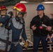 USS Ronald Reagan (CVN 76) Sailors practice firefighting drill.