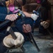 USS Ronald Reagan (CVN 76) Sailors remove floor tiles