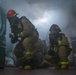 USS Ronald Reagan (CVN 76) conducts a joint damage control drill