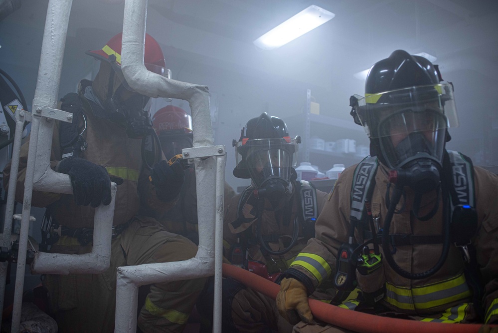 USS Ronald Reagan (CVN 76) conducts a joint damage control drill