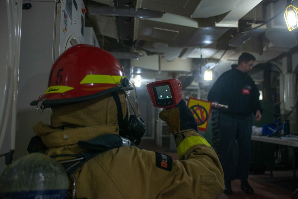 USS Ronald Reagan (CVN 76) conducts a joint damage control drill