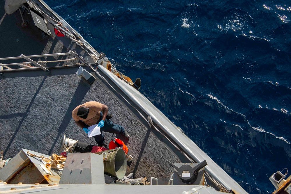 Sailor Performs Maintenance