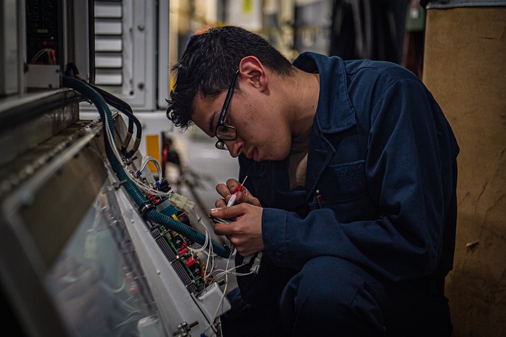 Sailors Conduct Maintenance