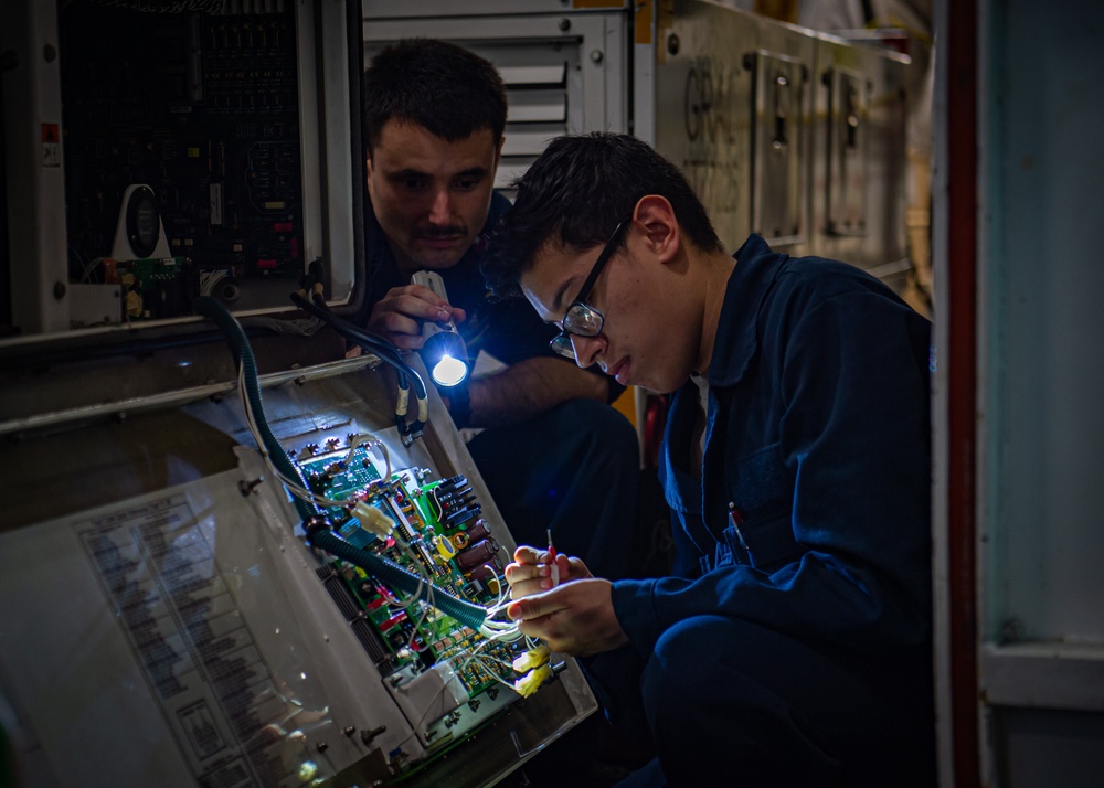 Sailors Conduct Maintenance