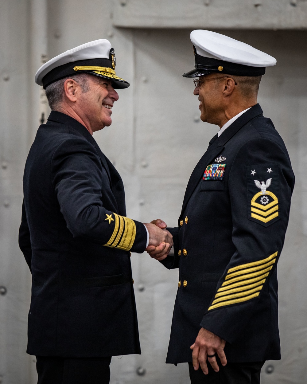 Vice Adm. Kitchener speaks at USS Arlington Sailor's retirement