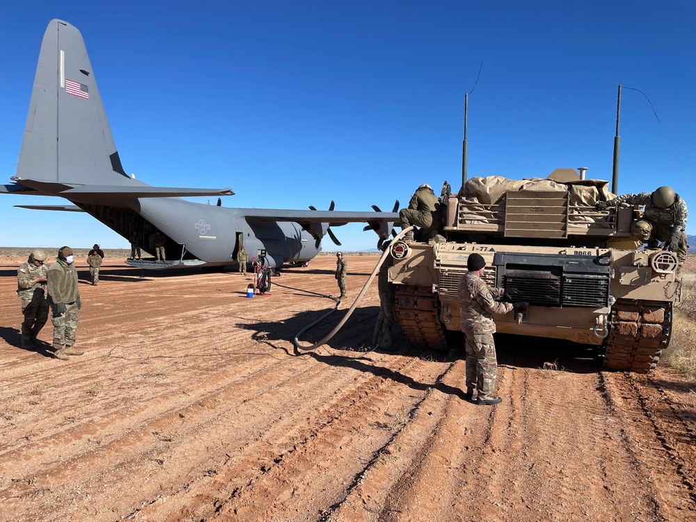 317th AW refuel M1A2 Tank from C-130J; a first in Air Force history