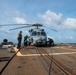 Sailors Prepare Helicopter For Flight Operations