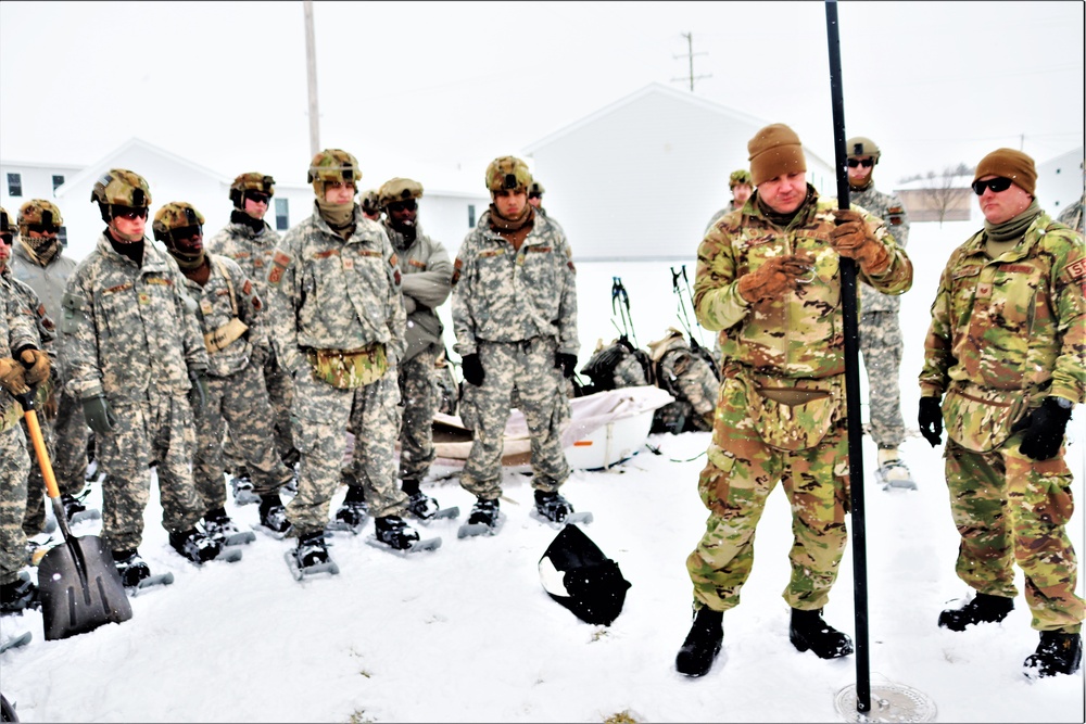 Tent-building among skills Airmen learned during January cold-weather training at Fort McCoy