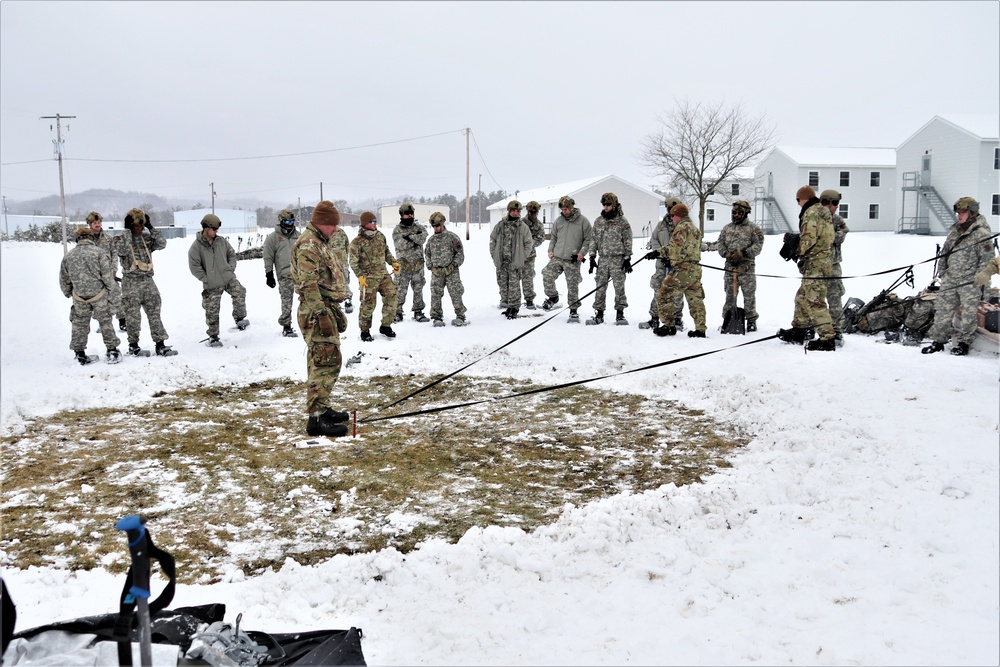 Tent-building among skills Airmen learned during January cold-weather training at Fort McCoy