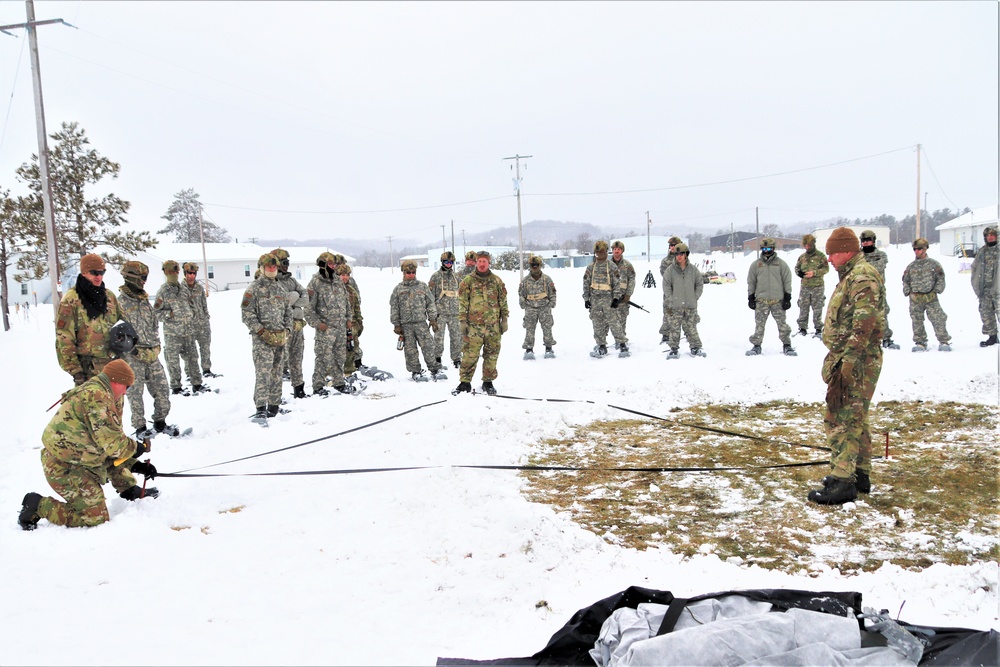 Tent-building among skills Airmen learned during January cold-weather training at Fort McCoy