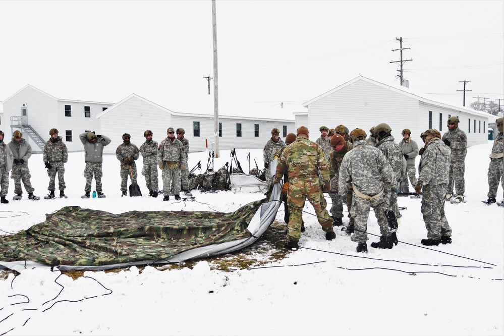 Tent-building among skills Airmen learned during January cold-weather training at Fort McCoy